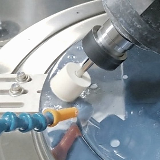 Polishing tool engaging stepped workpiece